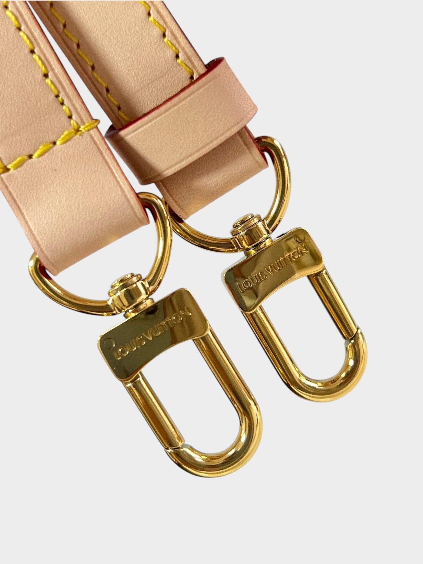 Zebass Louis Vuitton gold-tone metal lobster clasps on light leather straps with yellow stitching