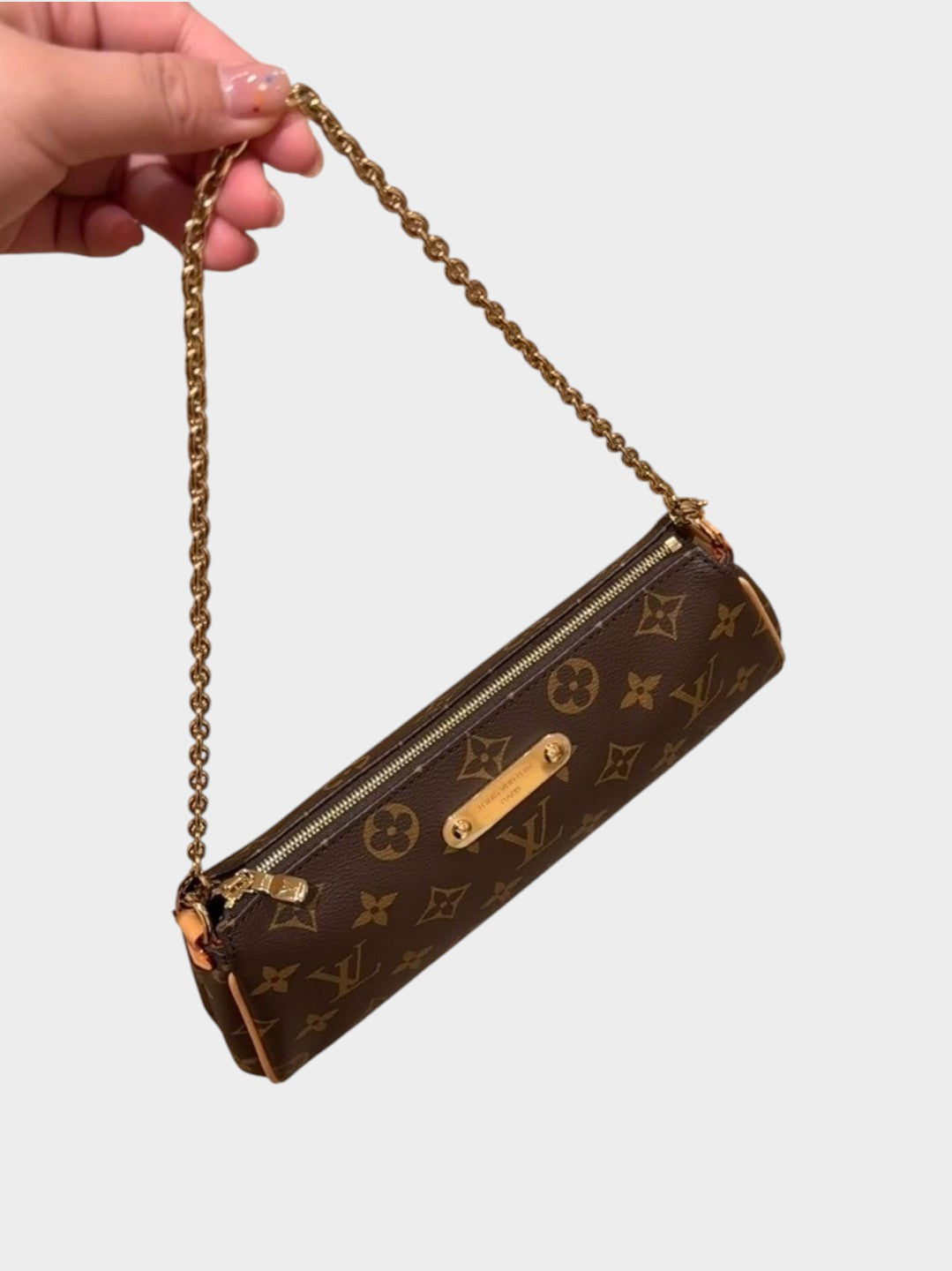 Zebass Louis Vuitton monogram canvas baguette shoulder bag with gold chain strap and polished hardware