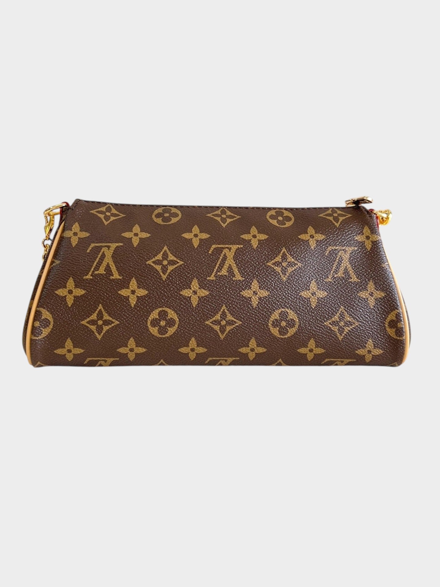 Zebass LOUIS VUITTON monogram canvas baguette shoulder bag with gold-tone chain strap and leather trim.